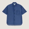 Cămașă cu cusături couture din denim albastru indigo cu sigla Givenchy Cămașă cu cusături couture din denim albastru indigo cu sigla Givenchy