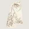 Fustă lungă din satin cu fundă și broderii Fustă lungă din satin cu fundă și broderii