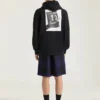 Hanorac cu glugă din fleece cu imprimeu clapetă de filmare Hanorac cu glugă din fleece cu imprimeu clapetă de filmare