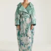 Palton lung cu tăieturi în jacquard cu trandafiri Palton lung cu tăieturi în jacquard cu trandafiri