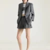 Pantaloni scurți din lână cu pli dublu Pantaloni scurți din lână cu pli dublu